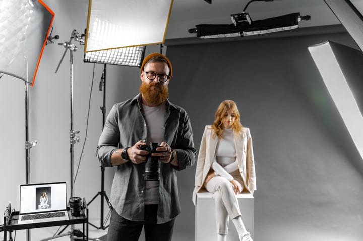 Photographer and Model in Contemporary Studio Setting