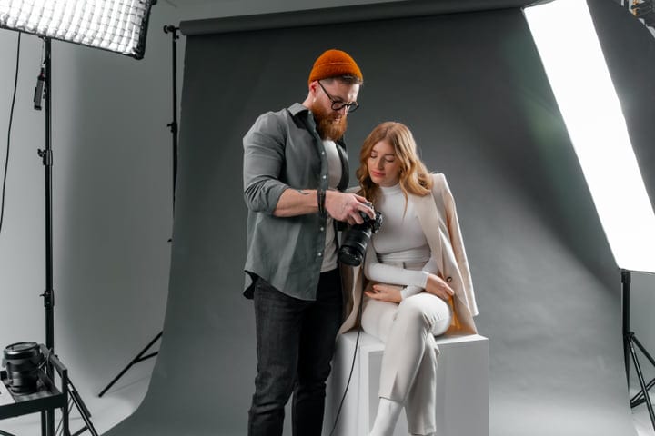 Creative Collaboration Unfolds In A Professional Photo Studio