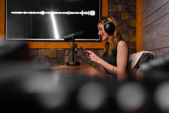 Podcaster Shares Her Story In Cozy Studio Setting