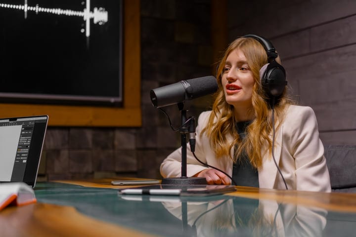 Engaging Podcast Host Speaks Into Professional Microphone