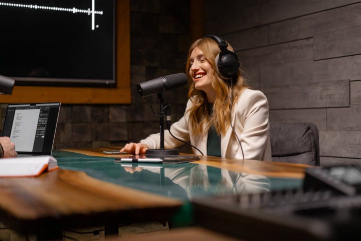 Engaged Host Records A Podcast In Professional Studio