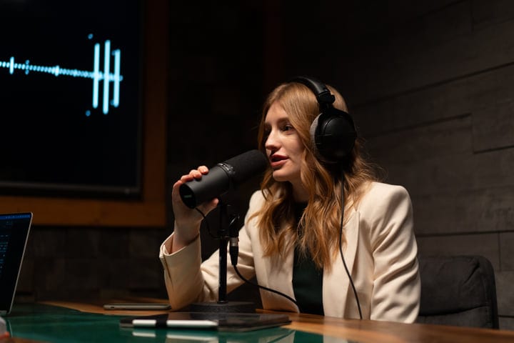Engaged Host Recording In A Modern Podcast Studio