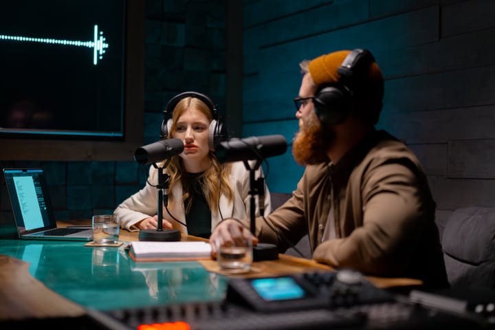 Engaging Dialogue Unfolds In A Modern Podcast Studio