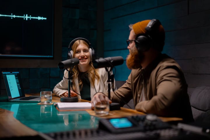 Dynamic Podcast Duo Shares Insights In Cozy Studio