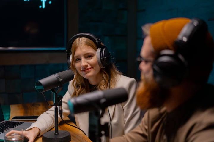 Engaging Podcast Discussion Under Soft Studio Lights