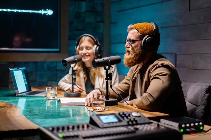 Engaging Conversations Unfold In A Cozy Podcast Studio