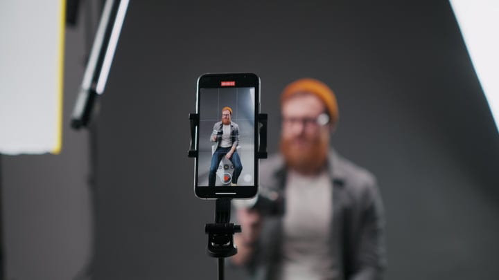 Creative Mind Captured Through A Smartphone Lens In Studio
