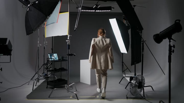 Inside A Modern Photographer's Studio With Dynamic Lighting