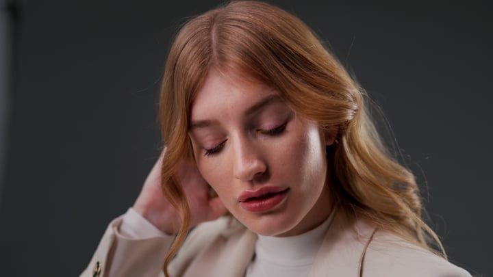 Contemplative Moment In The Studio With Soft Lighting