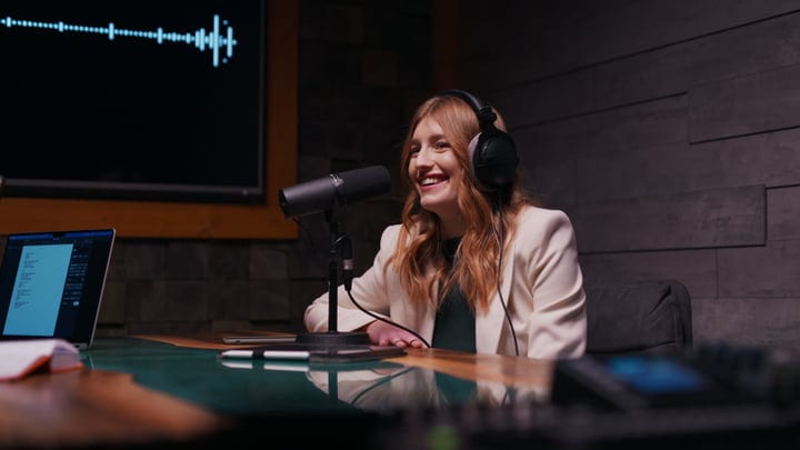 Engaged Host Recording Podcast in Modern Studio Setup