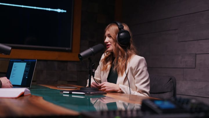 Engaging Podcast Host In Modern Studio Setting