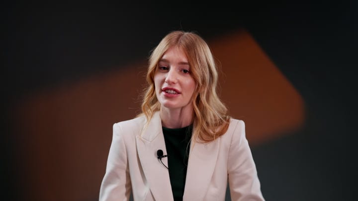 Confident Speaker Engages Audience In Studio Environment