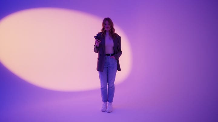 Confident Woman in Modern Studio Glow