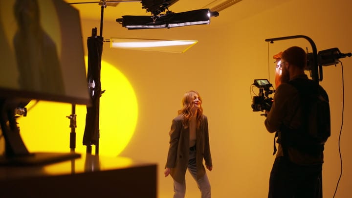 Dynamic Interaction In A Vibrant Photography Studio Setup