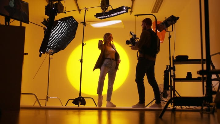 Creative Collaboration In A Vibrant Studio Setting