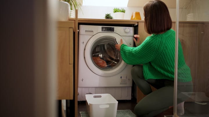 A Cozy Moment With Laundry And Warm Light