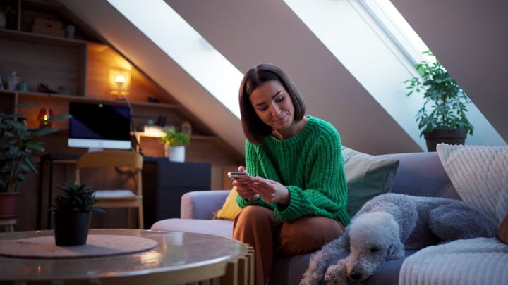 Cozy Moments With Smartphone In Bright Attic Room