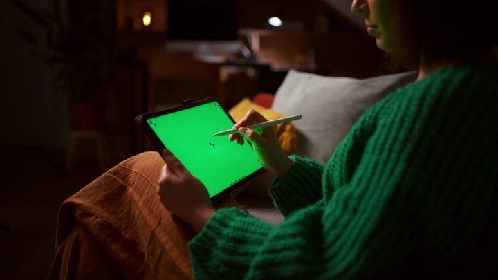 Cozy Evening Creativity With Tablet In Hand