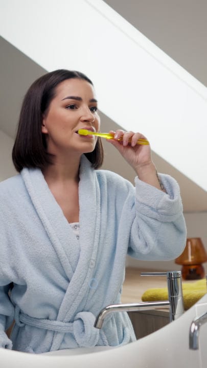 Morning Rituals: Woman Embraces A Fresh Start At Home