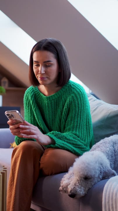 A Cozy Afternoon With A Phone And Furry Companion
