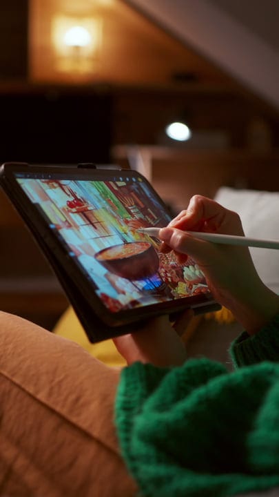 Creative Woman Sketching Art On A Tablet At Home