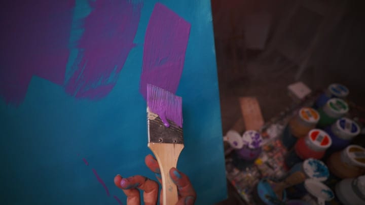 Brush Strokes Of Purple On A Vibrant Canvas