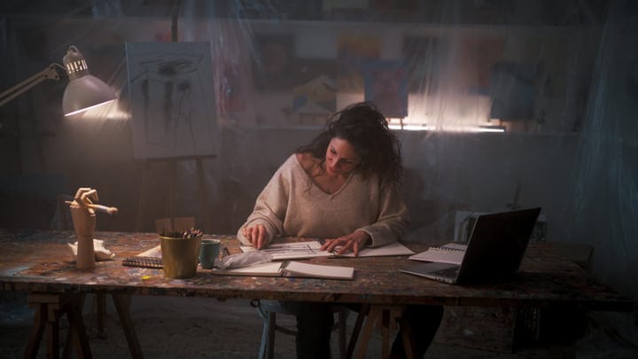 Creative Focus In A Cozy Artist's Studio Setting