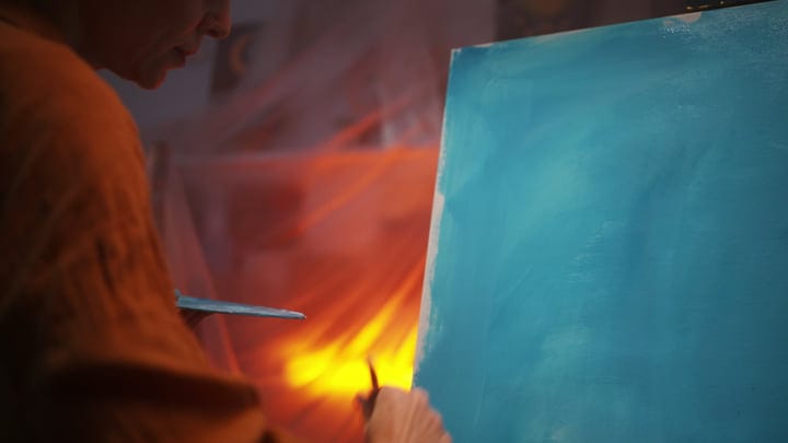 Brush Strokes Dance in a Sunlit Artist Studio