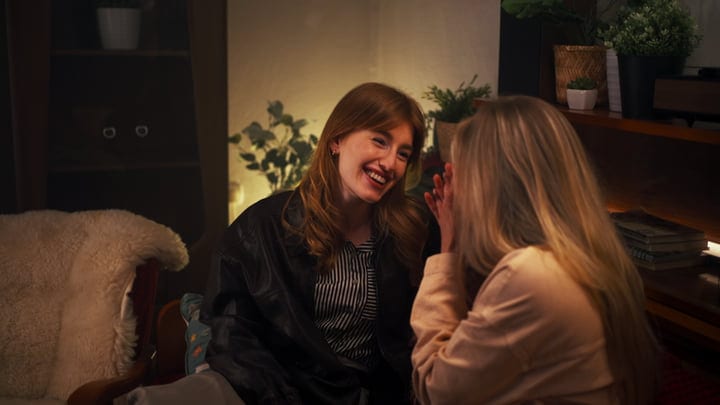 Laughter And Warmth In A Cozy Evening Retreat
