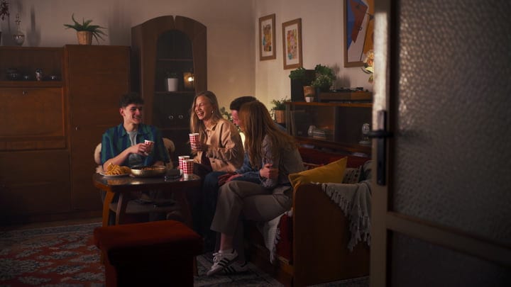 Warm Laughter Echoes In A Cozy Living Room