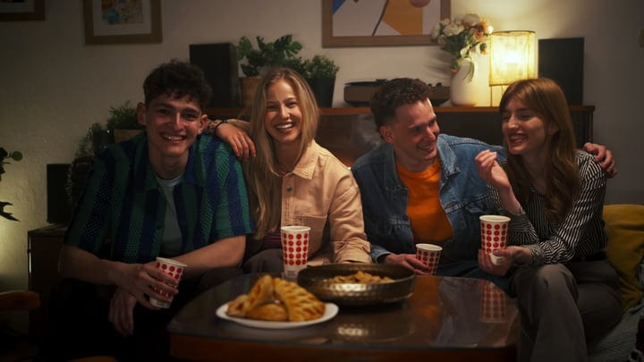 Laughter and Warmth Fill a Cozy Evening Gathering