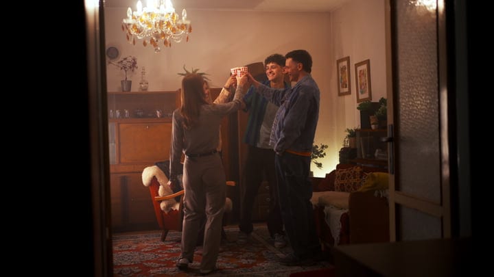 Friends Raise Their Glasses In Warm Celebration
