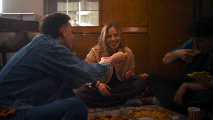 Laughter Fills The Room During Pizza Night