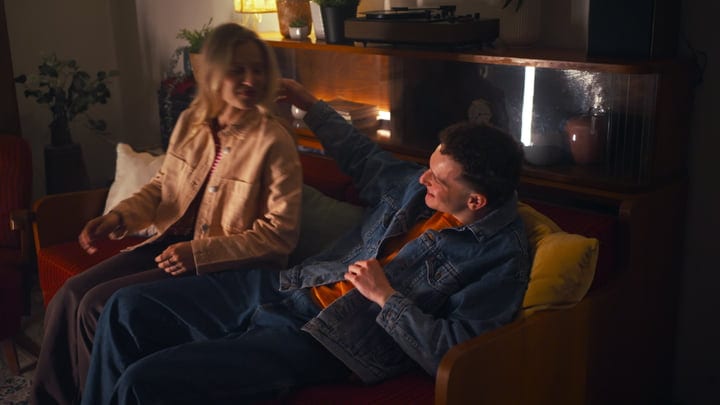 Laughter and Warmth Fill a Cozy Living Room
