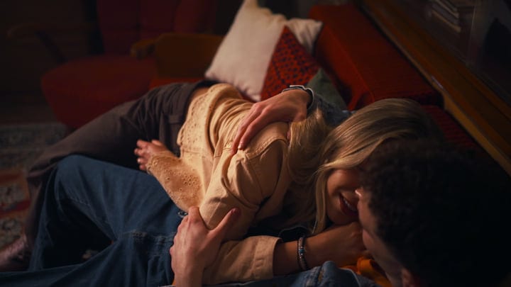 Warm Embrace On A Cozy Evening Couch