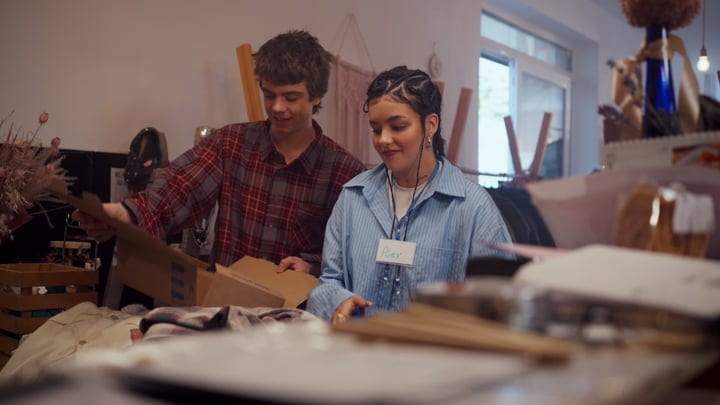 Friends Unwrap New Finds In A Cozy Boutique Setting