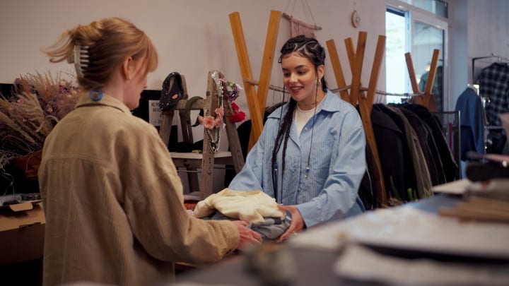 Lively Conversation Over Fashion Finds At The Boutique