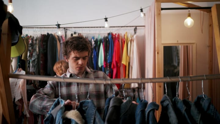 Young Friends Explore Fashion Finds In A Cozy Boutique