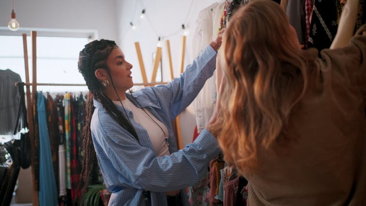 Friends Share a Joyful Moment in Chic Boutique