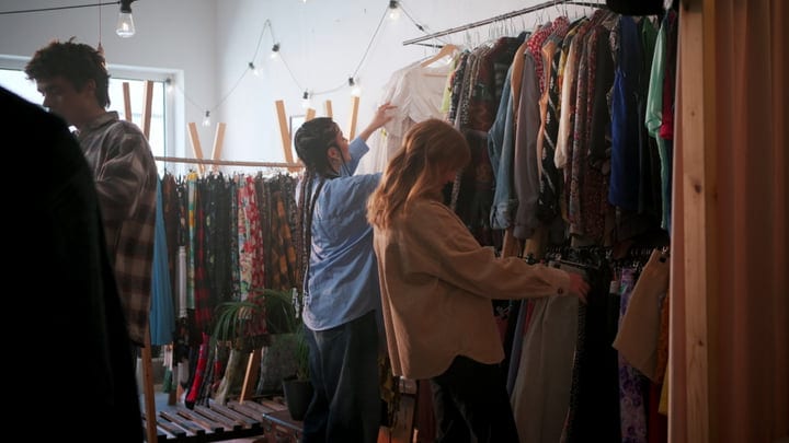 Friends Explore New Styles In A Cozy Boutique Setting