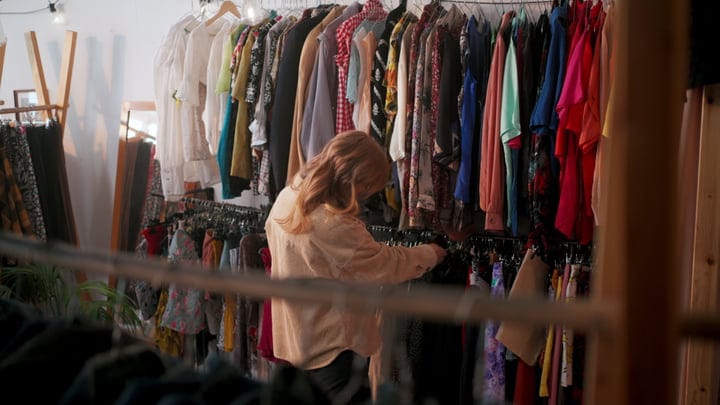 A Woman Finds Unique Style In A Quaint Boutique