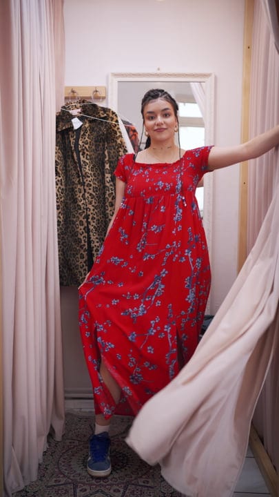 Joyful Moment As She Twirls In Boutique Dressing Room