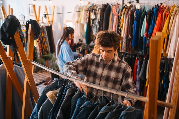 Young Friends Discover Unique Finds In A Cozy Boutique