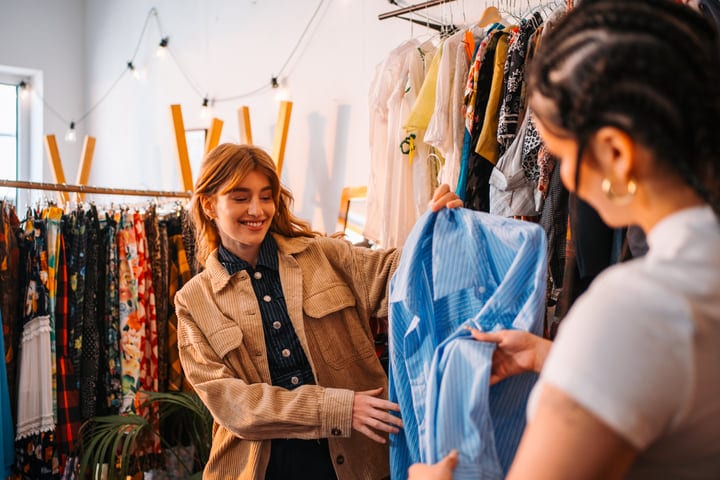 Joyful Moments Among Friends Exploring a Boutique