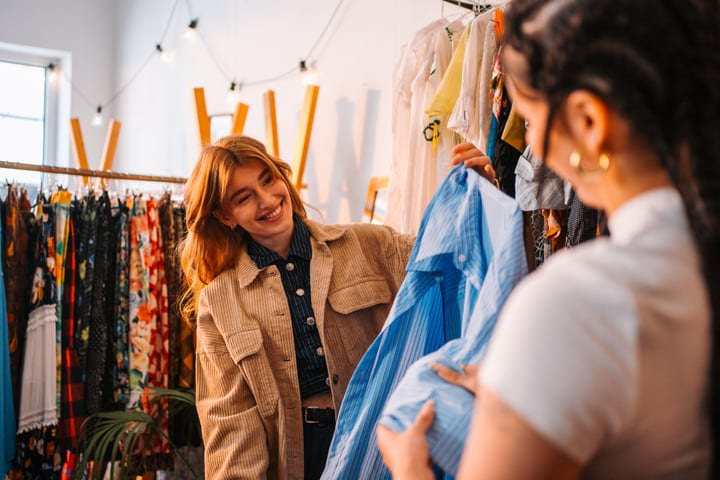 Joyful Friends Discover Unique Styles In A Cozy Boutique