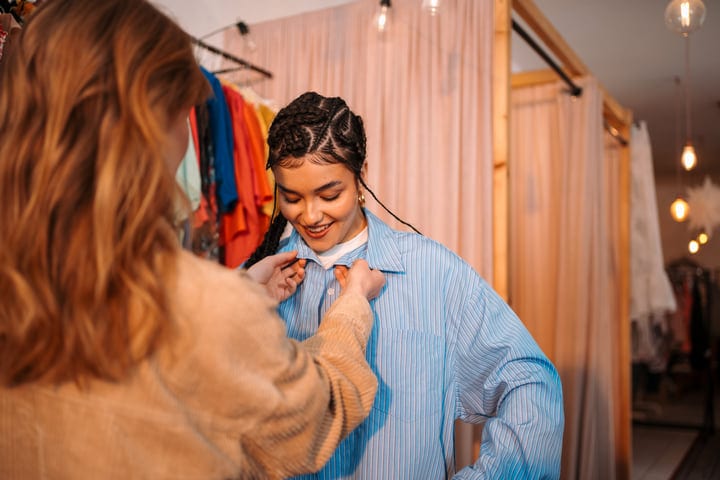 Joyful Friends Discover New Styles In Boutique Setting