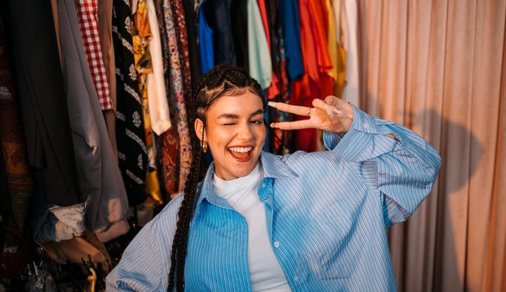 Joyful Fashion Exploration In A Vibrant Boutique Setting