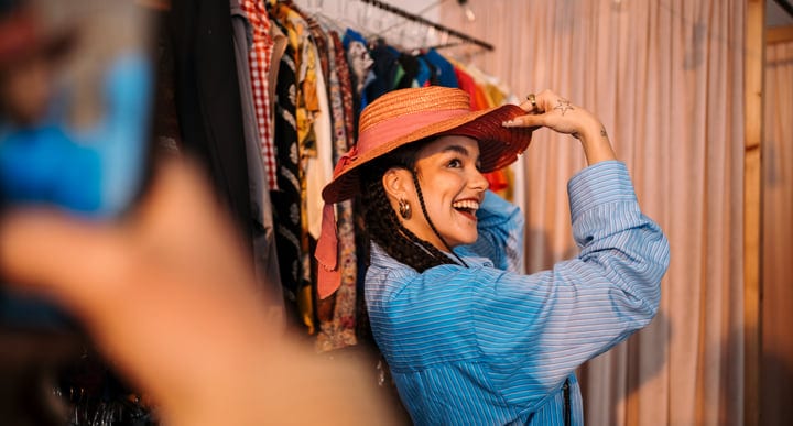 Joyful Exploration Of Fashion In A Cozy Boutique Setting