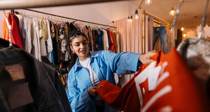 Young Shopper Finds Unique Styles In Urban Boutique