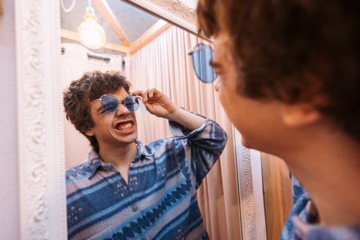 Youthful Enthusiasm In Fashionable Boutique Dressing Room